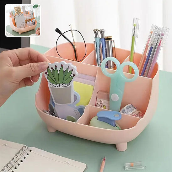 Organisateur de bureau rose à six compartiments pour fournitures diverses.