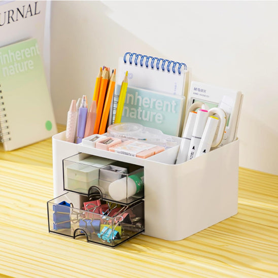 organiseur pour bureau blanc rempli de fournitures
